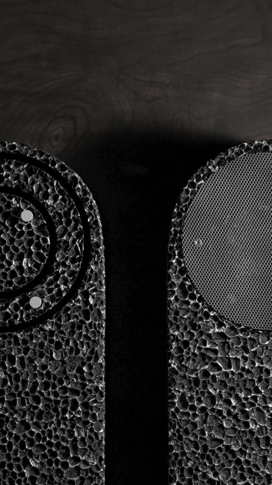 Closeup of front and back of From Foam to dust Table Clock on a wooden shelf.