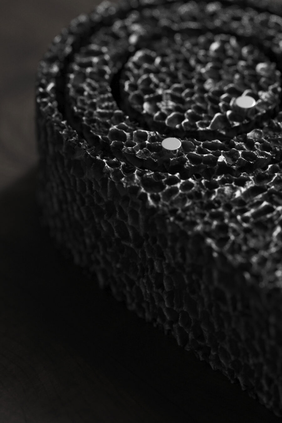 Closeup of From Foam to Dust Table clock showing texture and detail of the face