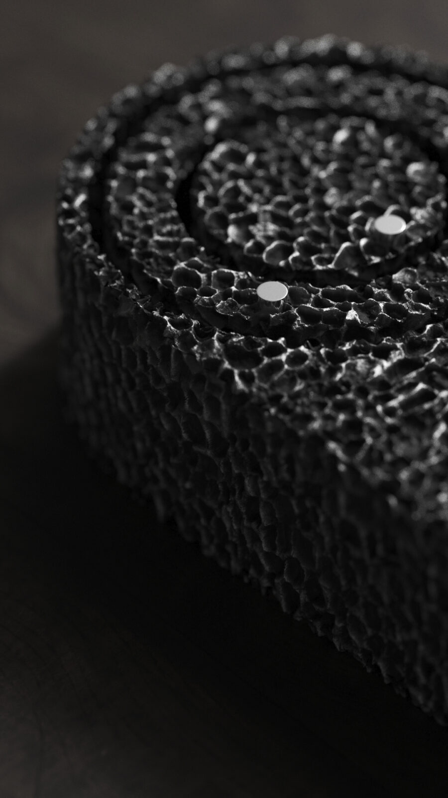 Closeup of From Foam to Dust Table clock showing texture and detail of the face