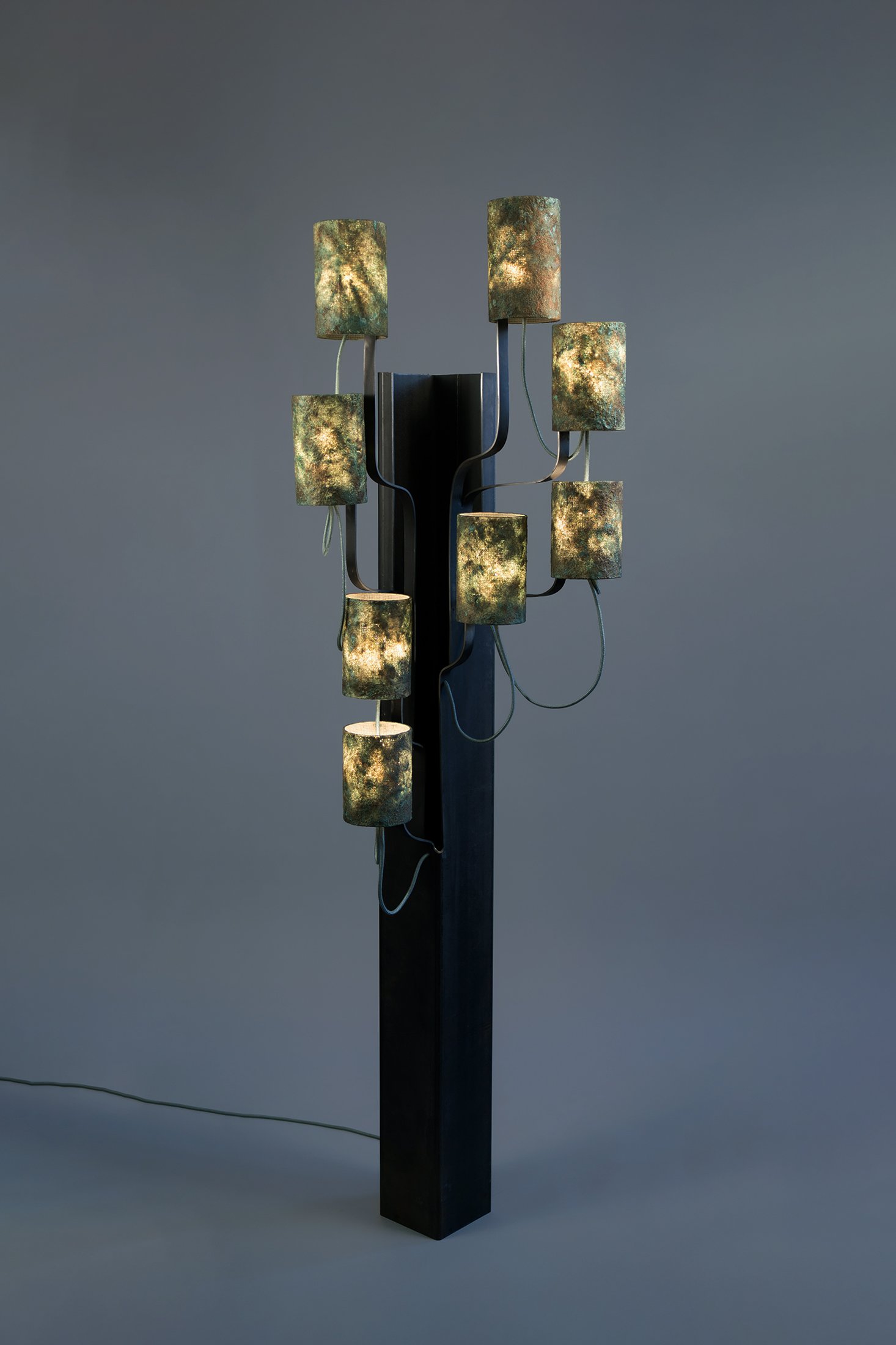 Floor standing lamp made from large steel pipe with branches and green stone tyle lampshades